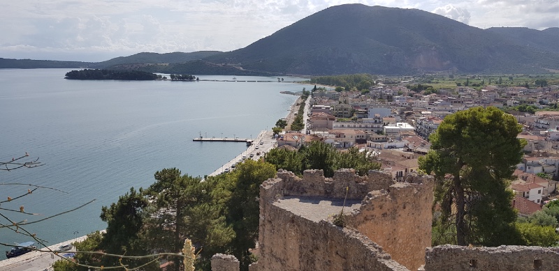 Picture of a town and bay from a hill